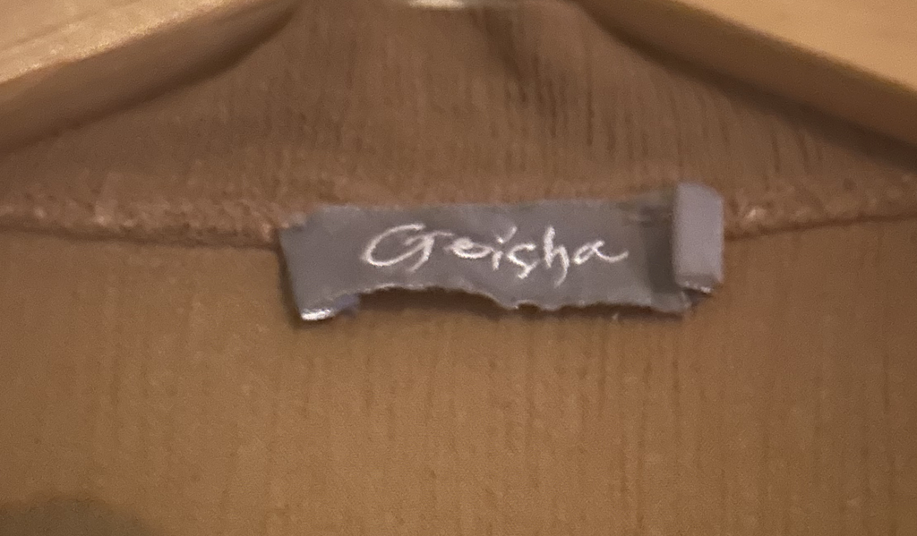 Mouwloze top van Geisha. Kleur Groen. Mt L